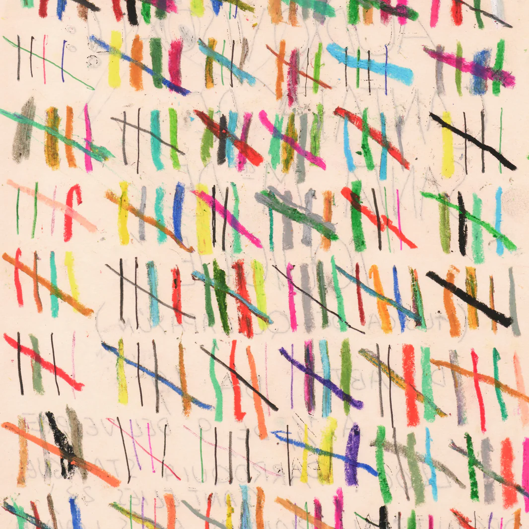 Tally mark detail on beige paper